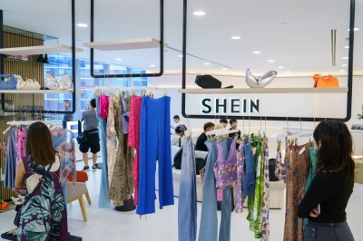 Clothes displayed at Shein’s headquarters in Singapore