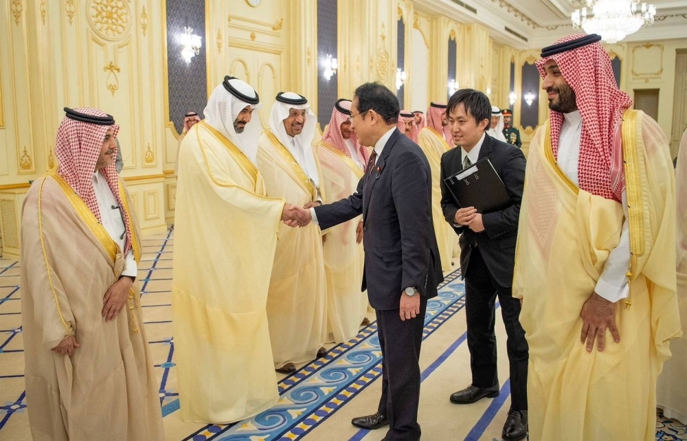 Prime Minister Fumio Kishida meets with Saudi Arabian Crown Prince Mohammed bin Salman and other officials in Jeddah, Saudi Arabia, on Sunday.