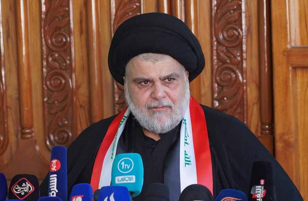 Iraqi Shiite leader Muqtada al-Sadr delivers a speech in Najaf, Iraq, on Thursday.