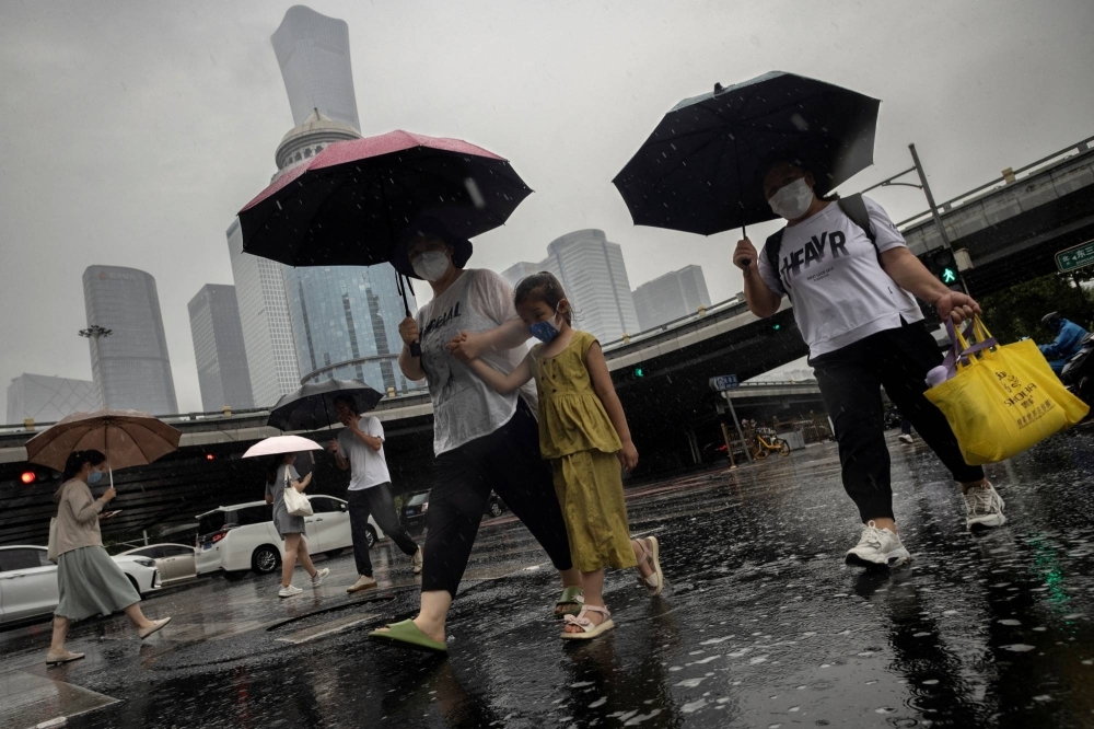 The Central Business District on a rainy day in Beijing. Both U.S. and European companies with exposure to China could be hit by its sluggish growth as its post-COVID-19 momentum has faltered rapidly.