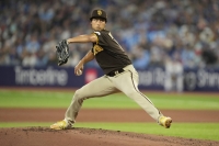 Padres starter Yu Darvish pitches against the Blue Jays in Toronto on Wednesday. | USA TODAY / VIA REUTERS