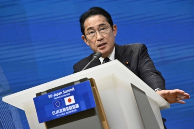 Prime Minister Fumio Kishida speaks during a news conference as part of the EU-Japan Summit at the European Union Building in Brussels on Thursday.