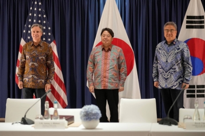 U.S. Secretary of State Antony Blinken, South Korean Foreign Minister Park Jin and Foreign Minister Yoshimasa Hayashi pose for a photo during their meeting in Jakarta on Friday.