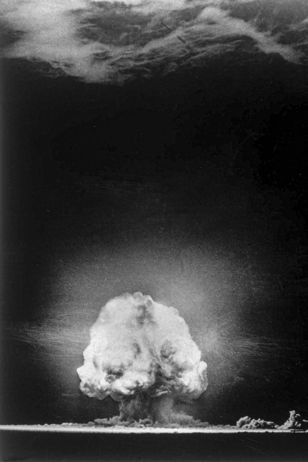 The mushroom cloud caused by the Trinity nuclear test is seen on July 16, 1945. A new study, released on Thursday ahead of submission to a scientific journal for peer review, shows that the cloud and its fallout went farther than anyone in the Manhattan Project had imagined in 1945.