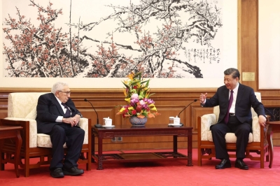 Chinese President Xi Jinping (right) speaks with former US secretary of state Henry Kissinger during a meeting in Beijing last week.