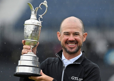 Brian Harman poses with the Claret Jug after winning the British Open in Hoylake, England, on Sunday.