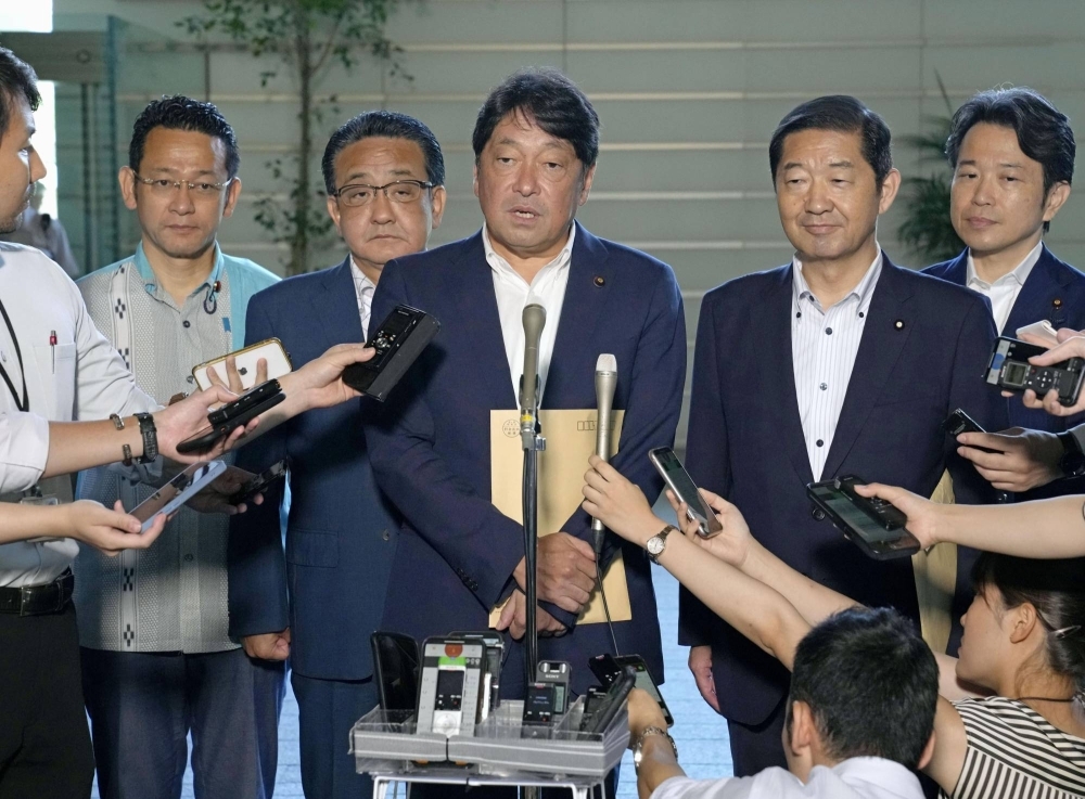 Itsunori Onodera, head of the Liberal Democratic Party's security panel, speaks to reporters after meeting with Prime Minister Fumio Kishida on Tuesday.