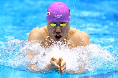 Qin Haiyang competes in the men's 100-meter breaststroke final during the World Aquatics Championships in Fukuoka on Monday.