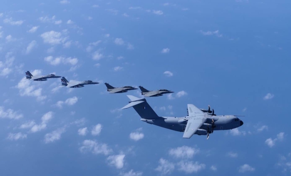 Two F-15 fighter aircraft from the ASDF fly alongside two Rafale jets and an A400M transport aircraft from the French Air and Space Force as the two forces kicked off Wednesday their first-ever joint fighter exercise in Japan