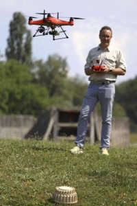 A drone used by the International Committee of the Red Cross is shown in a demonstration flight in a Geneva suburb on June 7. | Kyodo
