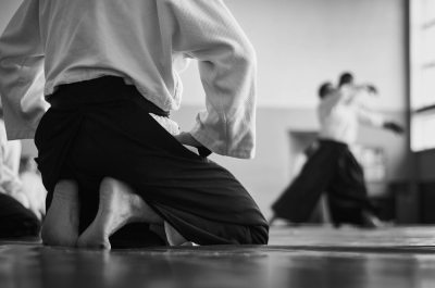 Like other martial arts, aikido takes the concept of 気 (ki, spirit/mind) and incorporates it into the philosophy of the sport.  