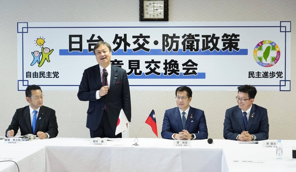 Iwao Horii (second from left), a lawmaker from the ruling Liberal Democratic Party, speaks during a meeting between the LDP and Taiwan's ruling Democratic Progressive Party in Tokyo on Thursday.