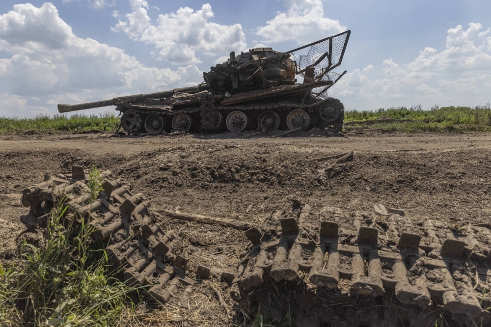 A destroyed Russian tank in the village of Novodarlivka, Ukraine, which was recaptured by Ukrainian forces, on July 6.
