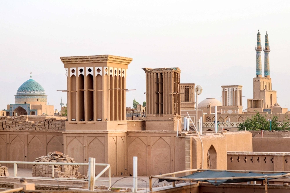 Wind-catchers in Iran's central city of Yazd. The tall, chimney-like towers are just one of the engineering marvels inhabitants have developed to adapt to the harsh desert climate in central Iran.