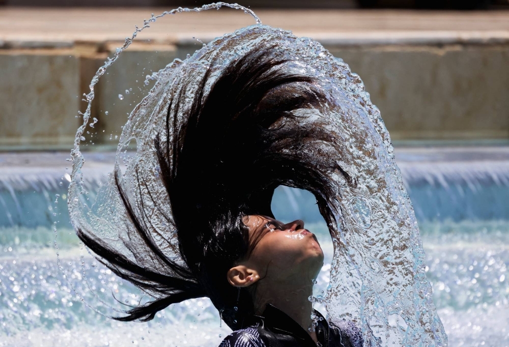 A girl cools off in the water amid a heat wave in Hurghada, Egypt, on Thursday. 