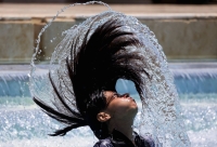 A girl cools off in the water amid a heat wave in Hurghada, Egypt, on Thursday.  | Reuters 