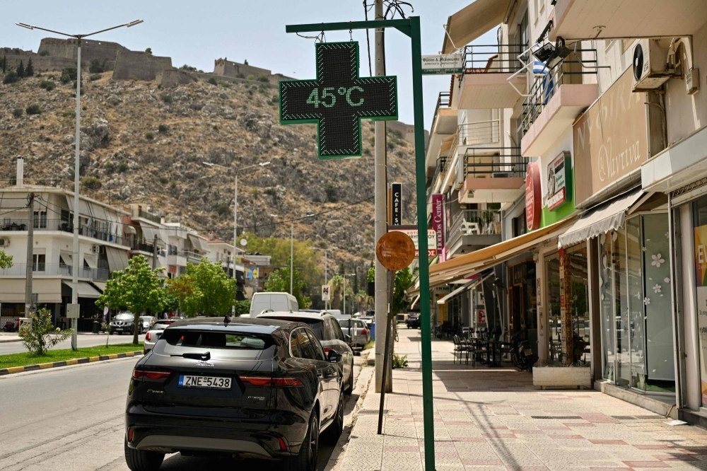A thermometer reads 45 degrees Celsius in the tourist city of Nafplion, Greece, on Wednesday as the country endures one of its longest heat waves ever. 