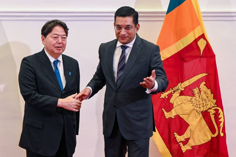 Foreign Minister Yoshimasa Hayashi and his Sri Lanka counterpart, Ali Sabry, during a joint news conference in Colombo on Saturday