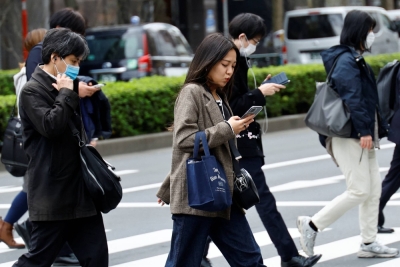 Commuters in Tokyo in March. Japanese women are paid on average around 67% the salaries of men, according to a report based on around 2,000 firms’ financial statements, compiled by advisory firm Willis Towers Watson and others this month. 