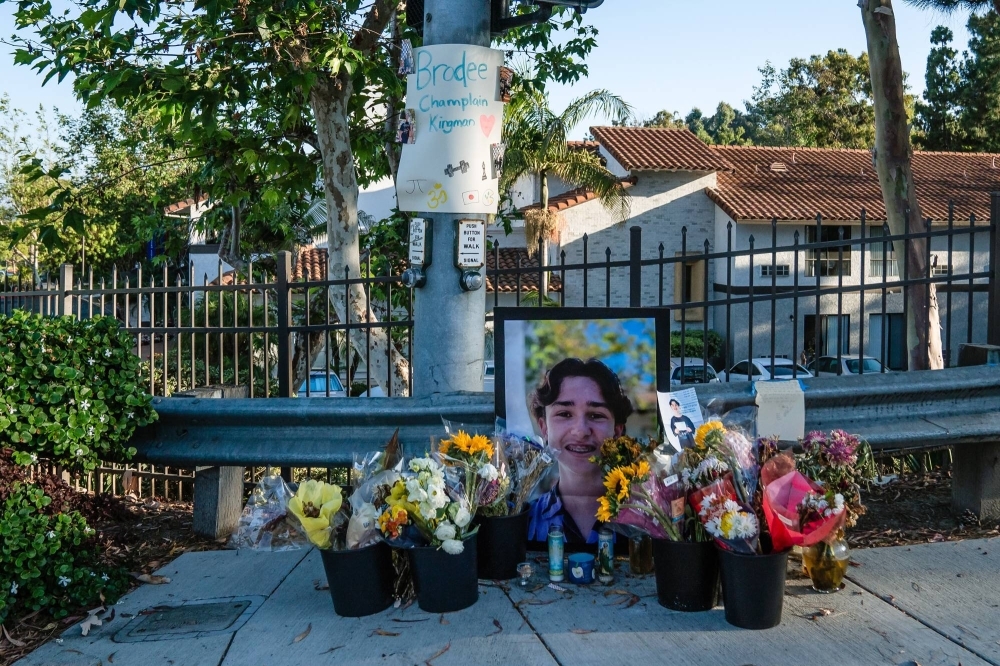 A memorial for Brodee Champlain Kingman on the corner of El Camino Real and Santa Fe Drive in Encinitas, California, on Thursday. The e-bike industry is booming, but many vehicles are not legal for teenagers, and accidents are on the rise.