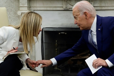 U.S. President Joe Biden welcomes Italian Prime Minister Giorgia Meloni to the Oval Office of the White House in Washington on Thursday.