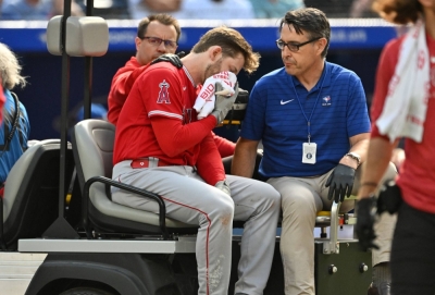 Angels outfielder Taylor Ward is taken off the field on a cart after being struck in the head by a pitch during a game against the Blue Jays in Toronto on July 29.