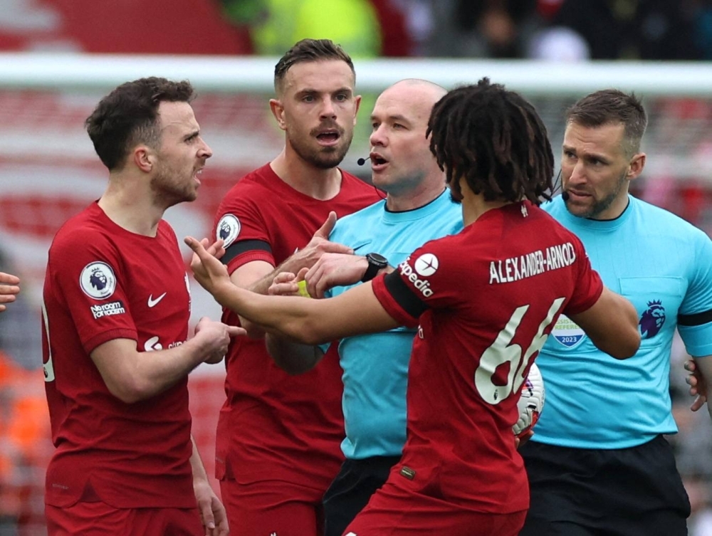 English players in all competitions could receive yellow cards for invading the personal space of a referee under new guidelines released by governing bodies on Monday.