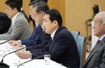 Prime Minister Fumio Kishida speaks at a meeting of the government and ruling parties held at the Prime Minister's Office in Tokyo on Tuesday. The My Number system was among the issues discussed at the meeting.