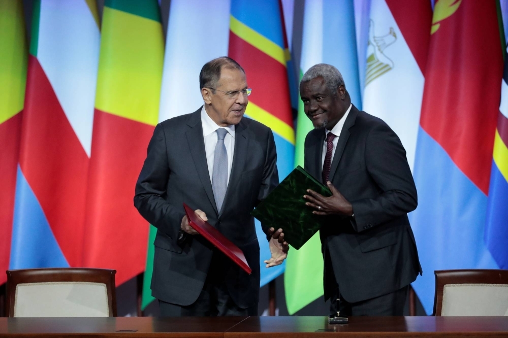 Russian Foreign Minister Sergei Lavrov and the chairperson of the African Union Commission, Moussa Faki Mahamat, attend a document signing ceremony during the Russia-Africa Summit in Sochi, Russia, in October 2019.