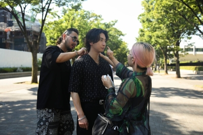 Shinjiro Atae, a J-pop idol who came out publicly as gay during a recent fan event, with his stylist and makeup artist in the afternoon prior to his announcement, in Tokyo on July 25.