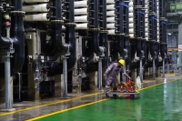 The Keppel Marina East Desalination Plant in Singapore on July 21. Public Utilities Board, which is responsible for Singapore's water management, has a long-term goal of reducing the energy use of water desalination to 1 killowatt-hours per 1,000 liters. | Bloomberg