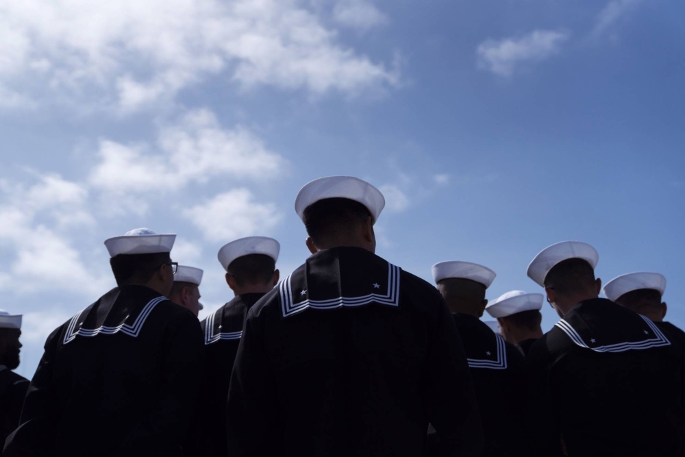Two U.S. Navy sailors have been arrested on charges of providing sensitive U.S. military information to China. Both men are Chinese-born naturalized U.S. citizens.