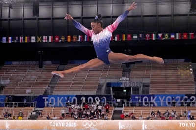 Simone Biles competes on the balance beam during the 2020 Tokyo Olympics at Ariake Gymnastics Centre. 