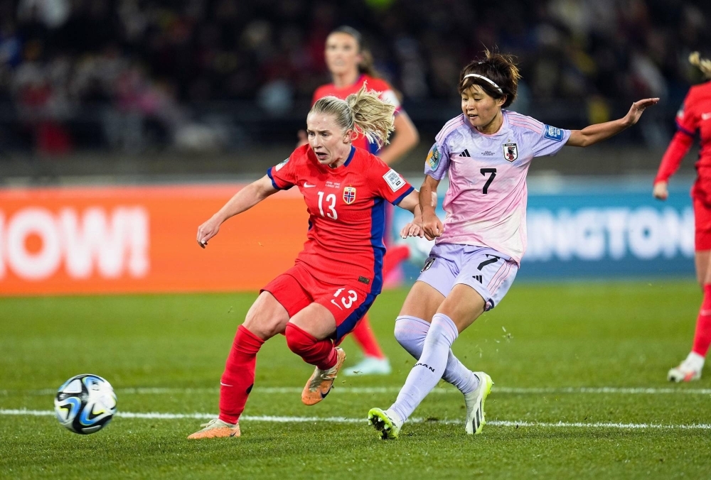 Hinata Miyazawa (right) scores Japan's third goal of the night against Norway during their 2023 FIFA Women's World Cup round-of-16 match in Wellington on Saturday.
