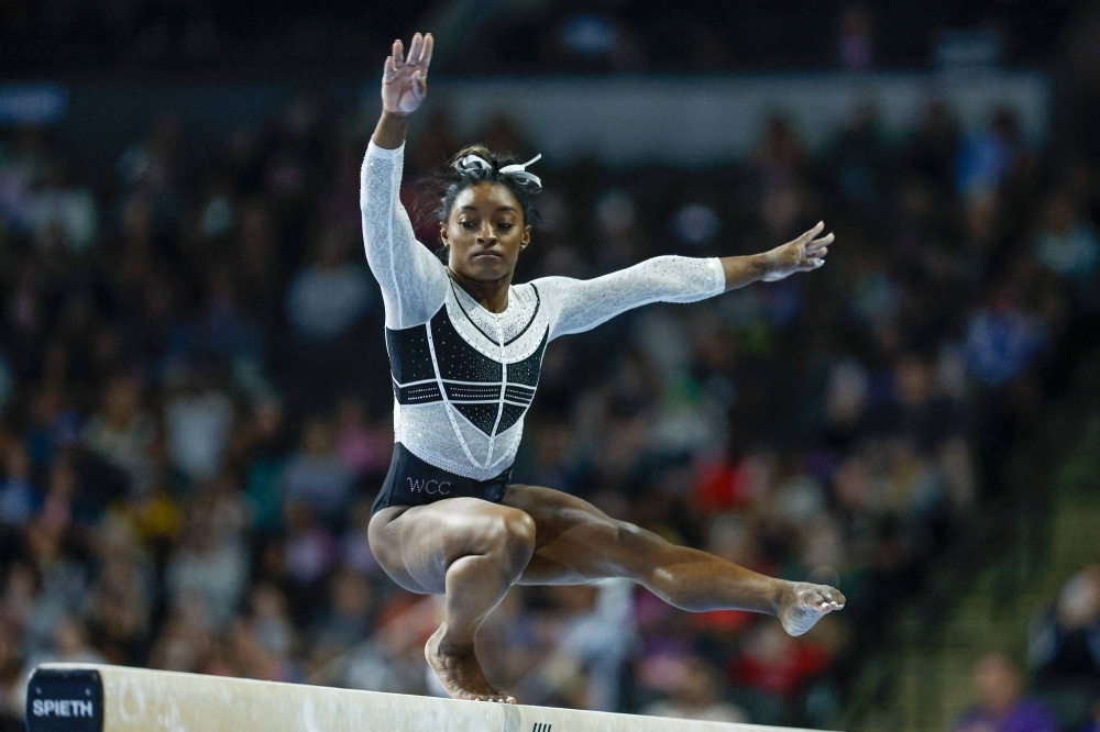 Simone Biles performs on the balance beam during the U.S. Classic in Hoffman Estates, Illinois, on Saturday.