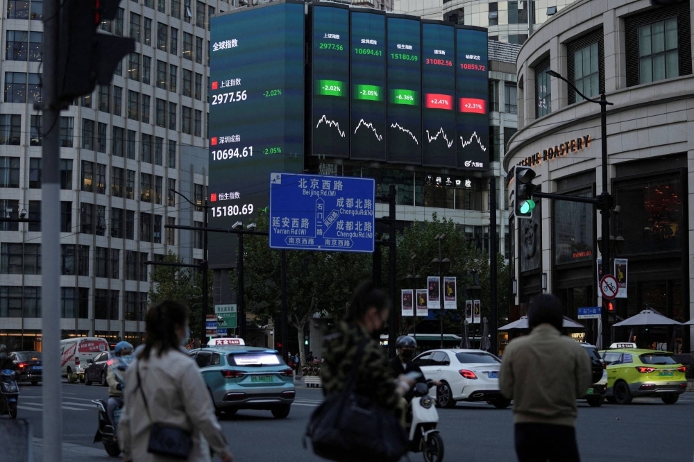 A stock board at an intersection in Shanghai in October 