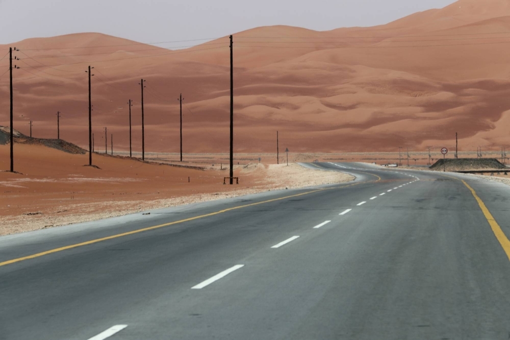 A highway runs through Saudi Arabia's arid landscape. A new horticulture project marks the biggest food-tech investment for the country, whose extreme summer temperatures have long left it reliant on food imports.