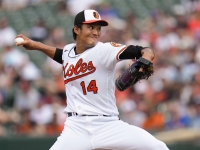 Orioles reliever Shintaro Fujinami pitches against the Mets in Baltimore on Sunday. | AP / VIA KYODO