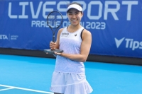 Nao Hibino celebrates with the trophy after winning the women's singles final of the Prague Open against Linda Noskova in Prague on Monday. | AFP-Jiji