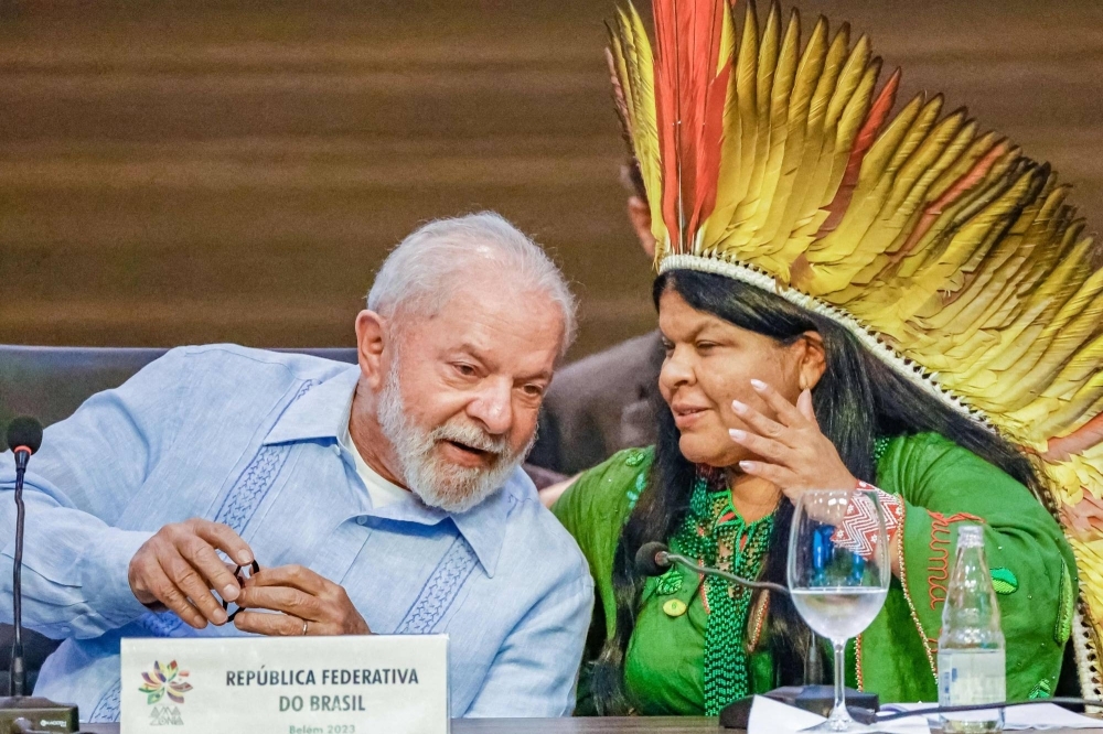 President Luiz Inacio Lula da Silva (left) and his minister of indigenous peoples, Sonia Guajajara, chat during the Amazon Summit IV Meeting of Presidents of States Parties to the Amazon Cooperation Treaty in Belem, Para State, Brazil, on Tuesday.