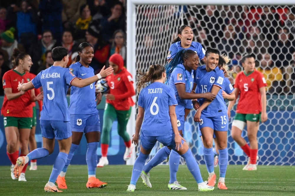 France players celebrate midfielder Kenza Dali's (right) goal against Morocco in the 2023 FIFA Women's World Cup round of 16 in Adelaide, Australia, on Tuesday.