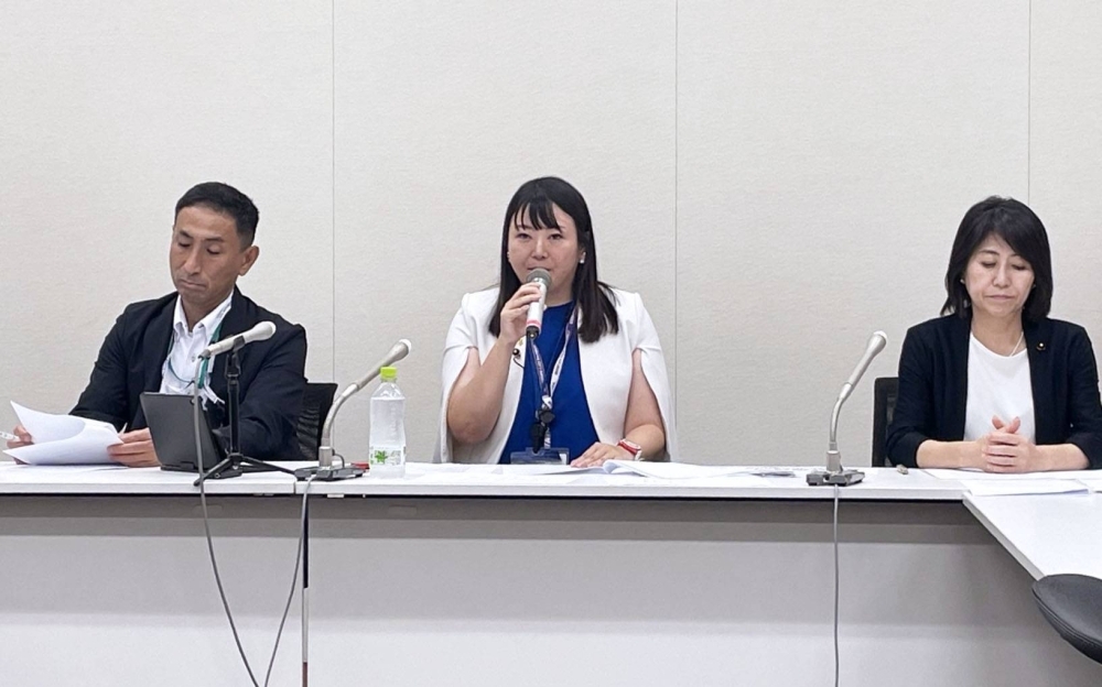 Yukiko Kuwazuru (center), a member of the Shibuya Ward Assembly, speaks during a news conference in Tokyo on Monday.