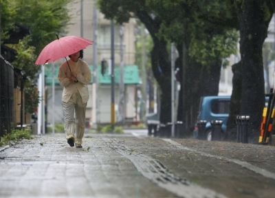 The streets of Kagoshima city on Wednesday amid strong winds from Typhoon Khanun. 