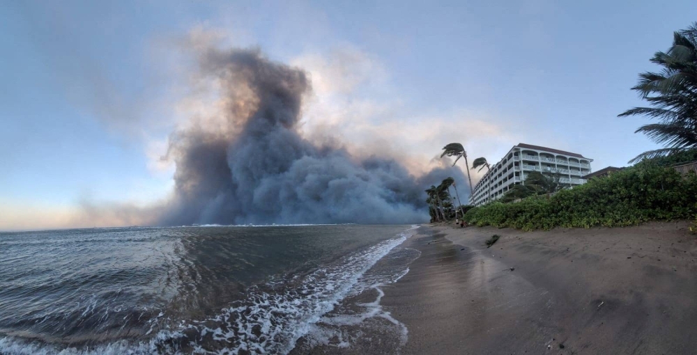 Smoke billows as wildfires driven by high winds destroy a large part of the historic town of Lahaina in Mauii County, Hawaii, on Wednesday.