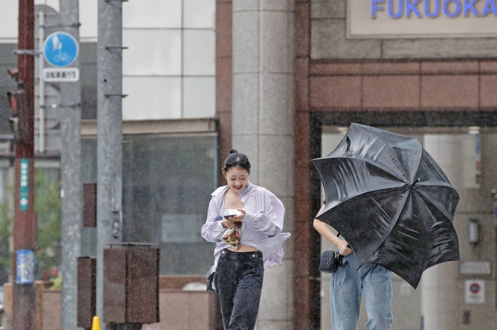 Heavy rain and strong wind hit the city of Fukuoka on Thursday as Tropical Storm Khanun approached the Kyushu region.