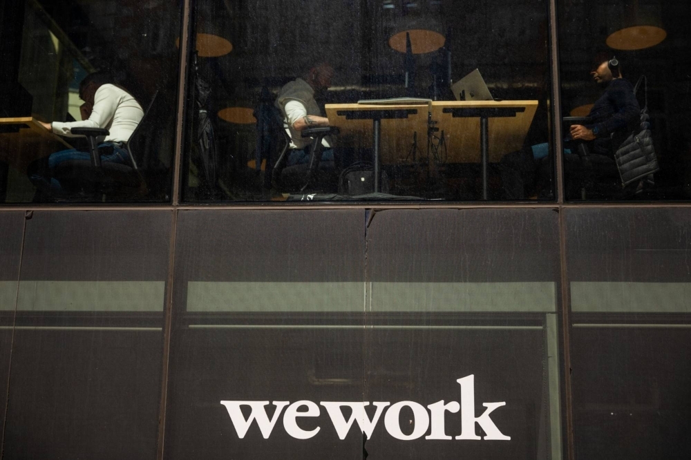 Workers at a WeWork coworking office in London