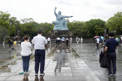 People offer silent prayers for the victims of the 1945 Nagasaki atomic bombing at the city's Peace Park on Wednesday to mark the 78th anniversary of the attack.