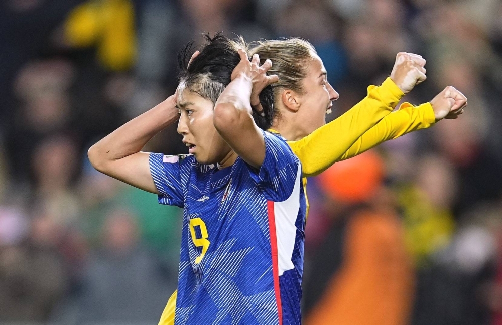 Japan's Riko Ueki (left) and Sweden goalkeeper Zecira Musovic react after Ueki's missed penalty during the second half of their Women's World Cup quarterfinal match in Auckland on Friday.