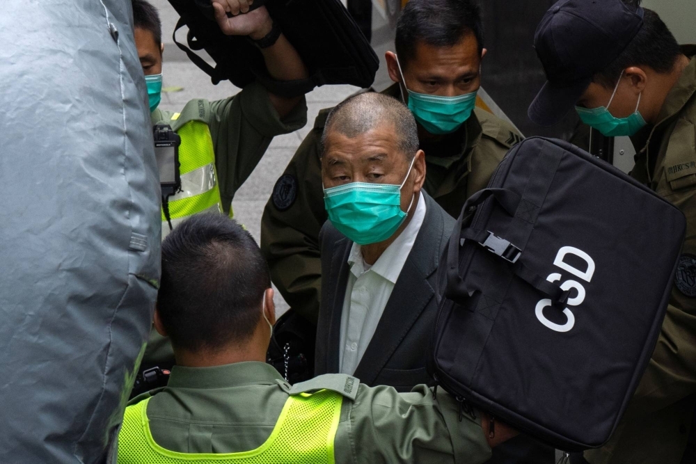 Jimmy Lai arrives for a court appearance in Hong Kong in February 2021.