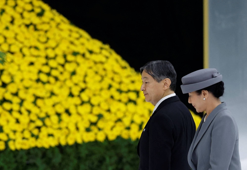 Emperor Naruhito and Empress Masako attend a memorial service marking the 78th anniversary of Japan's surrender in World War II at the Nippon Budokan Hall in Tokyo on Tuesday.